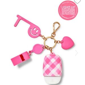 Hand sanitizer holder and accessories keychain. Brand new.